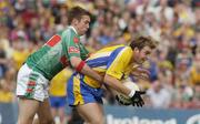 18 July 2004; David Casey, Roscommon, in action against Ronan McGarrity, Mayo. Bank of Ireland Connacht Senior Football Championship Final, Mayo v Roscommon, McHale Park, Castlebar, Co. Mayo. Picture credit; Pat Murphy / SPORTSFILE