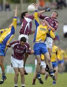 18 July 2004; Galway pair Shane Mannion, 8, and Fiachra Breathnach, contest a high ball with Enda Kenny, Roscommon. Connacht Minor Football Championship Final, Galway v Roscommon, McHale Park, Castlebar, Co. Mayo. Picture credit; Damien Eagers / SPORTSFILE