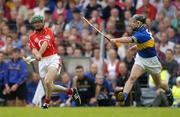 10 July 2004; Jerry O'Connor, Cork, in action against Colin Morrissey, Tipperary. Guinness Senior Hurling Championship Qualifier, Round 3, Cork v Tipperary, Fitzgerald Stadium, Killarney, Co. Kerry. Picture credit; Brendan Moran / SPORTSFILE
