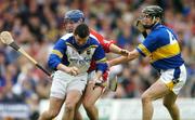 10 July 2004; Brendan Cummins, Tipperary, supported by team-mate Paul Curran (4), in action against Kieran Murphy, Cork. Guinness Senior Hurling Championship Qualifier, Round 3, Cork v Tipperary, Fitzgerald Stadium, Killarney, Co. Kerry. Picture credit; Brendan Moran / SPORTSFILE