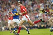 10 July 2004; Sean Og O'hAilpin, Cork, in action against Declan Fanning, Tipperary. Guinness Senior Hurling Championship Qualifier, Round 3, Cork v Tipperary, Fitzgerald Stadium, Killarney, Co. Kerry. Picture credit; Brendan Moran / SPORTSFILE