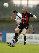 20 July 2004; Sean Francis, Longford Town, in action against Declan Boyle, Finn Harps. eircom League Cup Semi-Final, Finn Harps v Longford Town, Finn Park, Ballybofey, Co. Donegal. Picture credit; David Maher / SPORTSFILE