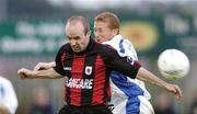 20 July 2004; Alan Kirby, Longford Town, in action against Tom Mohan, Finn Harps. eircom League Cup Semi-Final, Finn Harps v Longford Town, Finn Park, Ballybofey, Co. Donegal. Picture credit; David Maher / SPORTSFILE