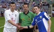 18 July 2004; Minor captains Pauric O'Neill, Kildare, and Craig Rogers, Laois, shake hands in the presence of referee Syl Doyle before the game. Leinster Minor Football Championship Final, Laois v Kildare, Croke Park, Dublin. Picture credit; Brian Lawless / SPORTSFILE