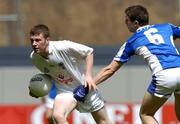 18 July 2004; Brian Bell, Kildare, in action against Colm Begley, Laois. Leinster Minor Football Championship Final, Laois v Kildare, Croke Park, Dublin. Picture credit; Brian Lawless / SPORTSFILE