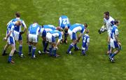 18 July 2004; Laois players adjust their socks before the pre-match parade. Bank of Ireland Leinster Senior Football Championship Final, Laois v Westmeath, Croke Park, Dublin. Picture credit; Ray McManus / SPORTSFILE