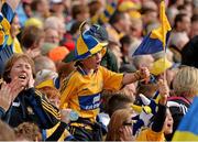8 September 2013; Clare supporter Colin Hogan, age 9, from Clare, celebrates after his side scored a point. GAA Hurling All-Ireland Championship Finals, Croke Park, Dublin. Picture credit: Barry Cregg / SPORTSFILE