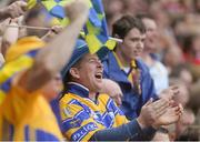 8 September 2013; A Clare supporter celebrates during the GAA Hurling All-Ireland Championship Finals, Croke Park, Dublin. Picture credit: Brian Lawless / SPORTSFILE