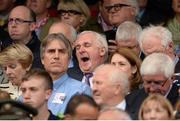 8 September 2013; Former Taoiseach Bertie Ahern yawns ahead of the game. GAA Hurling All-Ireland Senior Championship Final, Cork v Clare, Croke Park, Dublin. Picture credit: Stephen McCarthy / SPORTSFILE