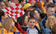 8 September 2013; A Cork supporter waves his flag after his team scored a point. GAA Hurling All-Ireland Championship Finals, Croke Park, Dublin. Picture credit: Barry Cregg / SPORTSFILE