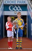 8 September 2013; Rebecca Barry, Gaelscoil An Ghoirt Alainn, Cork, and Eoghan Foudy, Ennis CBS Primary Schools, with the Liam MacCarthy Cup ahead of the game. GAA Hurling All-Ireland Senior Championship Final, Cork v Clare, Croke Park, Dublin. Picture credit: Stephen McCarthy / SPORTSFILE