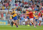 8 September 2013; Lorna Foley, from Bunscoil Bhóthar na Naoimh, Lismore, Co. Waterford, representing Clare, in action against Katie Condon, from Upperchurch N.S. Thurles, Co. Tipperary, representing Cork. INTO/RESPECT Exhibition GoGames during the GAA Hurling All-Ireland Senior Championship Final between Cork and Clare, Croke Park, Dublin. Picture credit: Matt Browne / SPORTSFILE