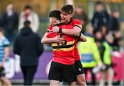 30 January 2024; Ronan Mahon, left, and Milo Quinn of CBC Monkstown celebrate after the Bank of Ireland Leinster Schools Senior Cup first round match between CBC Monkstown and St Gerard's School at Energia Park in Dublin. Photo by Ben McShane/Sportsfile