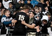 31 January 2024; Raef Donnelly of Cistercian College Roscrea celebrates with supporters after the Bank of Ireland Leinster Schools Senior Cup First Round match between Newbridge College and Cistercian College Roscrea at Energia Park in Dublin. Photo by David Fitzgerald/Sportsfile