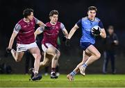 31 January 2024; Daire Cregg of UCD in action against Canice Mulligan, 6, and Cian Monaghan of University of Galway during the Electric Ireland Higher Education GAA Sigerson Cup quarter-final match between University of Galway and UCD at Dangan in Galway.  Photo by Piaras Ó Mídheach/Sportsfile