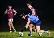 31 January 2024; Sam Callinan of UCD in action against Ruaidhrí Fallon of University of Galway during the Electric Ireland Higher Education GAA Sigerson Cup quarter-final match between University of Galway and UCD at Dangan in Galway.  Photo by Piaras Ó Mídheach/Sportsfile