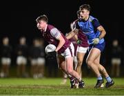 31 January 2024; Liam O'Conghaile of University of Galway in action against Seán Coffey of UCD during the Electric Ireland Higher Education GAA Sigerson Cup quarter-final match between University of Galway and UCD at Dangan in Galway.  Photo by Piaras Ó Mídheach/Sportsfile