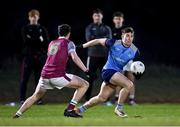 31 January 2024; Daire Cregg of UCD in action against Canice Mulligan of University of Galway during the Electric Ireland Higher Education GAA Sigerson Cup quarter-final match between University of Galway and UCD at Dangan in Galway.  Photo by Piaras Ó Mídheach/Sportsfile