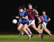 31 January 2024; Sam Callinan of UCD in action against Canice Mulligan of University of Galway during the Electric Ireland Higher Education GAA Sigerson Cup quarter-final match between University of Galway and UCD at Dangan in Galway.  Photo by Piaras Ó Mídheach/Sportsfile