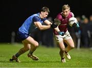 31 January 2024; Ryan O'Donoghue of University of Galway in action against Sam Callinan of UCD during the Electric Ireland Higher Education GAA Sigerson Cup quarter-final match between University of Galway and UCD at Dangan in Galway.  Photo by Piaras Ó Mídheach/Sportsfile
