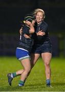 31 January 2024; Tuathia Dempsey of Metro, left, celebrates with team-mate Grace Munro after scoring their side's fifth try during the BearingPoint Sarah Robinson Cup round four match between North East and Metro at Skerries RFC in Skerries, Dublin. Photo by Sam Barnes/Sportsfile