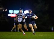 31 January 2024; Niall Carolan of TU Dublin in action against Darragh Canavan of Ulster University during the Electric Ireland Higher Education GAA Sigerson Cup quarter-final match between TU Dublin and Ulster University at Grangegorman in Dublin. Photo by Stephen Marken/Sportsfile