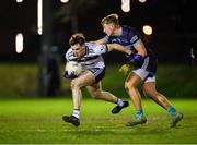31 January 2024; Ronan Boyle of Ulster University in action against Jack Lundy of TU Dublin during the Electric Ireland Higher Education GAA Sigerson Cup quarter-final match between TU Dublin and Ulster University at Grangegorman in Dublin. Photo by Stephen Marken/Sportsfile