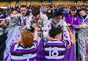 1 February 2024; Louis Kearney, right, and Locrcan Friery of Terenure College celebrates with supporters after the Bank of Ireland Leinster Schools Senior Cup First Round match between Kilkenny College and Terenure College at Energia Park in Dublin. Photo by Ben McShane/Sportsfile