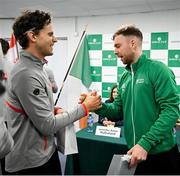 2 February 2024; Dominic Thiem of Austria, left, and Simon Carr of Ireland exchange gifts during the Davis Cup World Group I Play-off 1st Round draw ceremony ahead of the match between Ireland and Austria at the UL Sport Arena in Limerick. Photo by Brendan Moran/Sportsfile