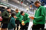 2 February 2024; Conor Gannon of Ireland signs an autograph for Úna Keane from Limerick during a meet and greet before the Davis Cup World Group I Play-off 1st Round draw ceremony ahead of the match between Ireland and Austria at the UL Sport Arena in Limerick. Photo by Brendan Moran/Sportsfile