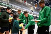 2 February 2024; Conor Gannon of Ireland signs an autograph for Úna Keane from Limerick during a meet and greet before the Davis Cup World Group I Play-off 1st Round draw ceremony ahead of the match between Ireland and Austria at the UL Sport Arena in Limerick. Photo by Brendan Moran/Sportsfile