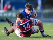 2 February 2024; David Leane of St Mary’s College is tackled by Chris Maclachlann Hickey of Wesley College during the Bank of Ireland Leinster Schools Senior Cup First Round match between St Mary's College and Wesley College at Energia Park in Dublin. Photo by Dáire Brennan/Sportsfile