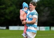 2 February 2024; Jack Pollard of Blackrock College, celebrates with his sister Sallyann Pollard, aged 2, after his side's victory in the Bank of Ireland Leinster Schools Senior Cup First Round match between The High School and Blackrock College at Ollie Campbell Park in Dublin. Photo by Tyler Miller/Sportsfile
