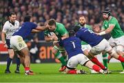 2 February 2024; Joe McCarthy of Ireland is tackled by France players, from left, Peato Mauvaka, Cyril Baille, and Paul Gabrillagues during the Guinness Six Nations Rugby Championship match between France and Ireland at the Stade Velodrome in Marseille, France. Photo by Ramsey Cardy/Sportsfile