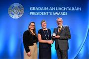 2 February 2024; Patsy Hetherton of St Vincent's GAA Club, Dublin, is presented with the Camogie award by Uachtarán Chumann Lúthchleas Gael Larry McCarthy and Claire Liston, sponsorship brand manager, AIB, during the Gradaim an Uachtaráin at Croke Park in Dublin. Photo by Stephen McCarthy/Sportsfile