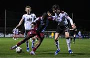 2 February 2024; Frantz Pierrot of Drogheda United in action against Jamie Walker, left, and Louie Annesley of Dundalk during the PTSB Leinster Senior Cup / Malone Cup match between Dundalk and Drogheda United at Oriel Park in Dundalk, Louth. Photo by Ben McShane/Sportsfile