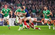 2 February 2024; Calvin Nash of Ireland is tackled by Gael Fickou of France during the Guinness Six Nations Rugby Championship match between France and Ireland at the Stade Velodrome in Marseille, France. Photo by Ramsey Cardy/Sportsfile