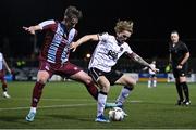 2 February 2024; Jamie Walker of Dundalk in action against Oisin Gallagher of Drogheda United during the PTSB Leinster Senior Cup / Malone Cup match between Dundalk and Drogheda United at Oriel Park in Dundalk, Louth. Photo by Ben McShane/Sportsfile