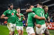 2 February 2024; Calvin Nash of Ireland, 14, celebrates with team-mates Jamison Gibson-Park, third from left, and Andrew Porter, right, after scoring their side's third try during the Guinness Six Nations Rugby Championship match between France and Ireland at the Stade Velodrome in Marseille, France. Photo by Harry Murphy/Sportsfile