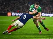 2 February 2024; Joe McCarthy of Ireland is tackled by Maxime Lucu of France during the Guinness Six Nations Rugby Championship match between France and Ireland at the Stade Velodrome in Marseille, France. Photo by Harry Murphy/Sportsfile