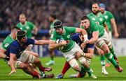 2 February 2024; Caelan Doris of Ireland, supported by Joe McCarthy, is tackled by Gregory Alldritt, left, and Paul Willemse of France during the Guinness Six Nations Rugby Championship match between France and Ireland at the Stade Velodrome in Marseille, France. Photo by Ramsey Cardy/Sportsfile