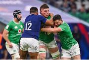 2 February 2024; Joe McCarthy of Ireland, supported by Robbie Henshaw, is tackled by Jonathan Danty of France during the Guinness Six Nations Rugby Championship match between France and Ireland at the Stade Velodrome in Marseille, France. Photo by Ramsey Cardy/Sportsfile