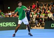 3 February 2024; Michael Agwi of Ireland in action against Dominic Thiem of Austria during their singles match on day one of the Davis Cup World Group I Play-off 1st Round match between Ireland and Austria at UL Sport Arena in Limerick. Photo by Brendan Moran/Sportsfile