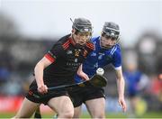 3 February 2024; Michael Collins of Ardscoil Ris in action against Jake Hackett of Nenagh CBS during the TUS Dr Harty Cup final match between Nenagh CBS, of Nenagh and Ardscoil Ris, of Limerick at Cusack Park in Ennis. Photo by John Sheridan/Sportsfile