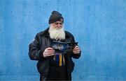 3 February 2024; Tipperary supporter Seamus Fahey, from Crookstown, Kildare, inspects the match programme before the Allianz Hurling League Division 1 Group B match between Dublin and Tipperary at Parnell Park in Dublin. Photo by Tyler Miller/Sportsfile