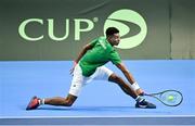 3 February 2024; Michael Agwi of Ireland in action against Dominic Thiem of Austria during their singles match on day one of the Davis Cup World Group I Play-off 1st Round match between Ireland and Austria at UL Sport Arena in Limerick. Photo by Brendan Moran/Sportsfile