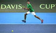 3 February 2024; Michael Agwi of Ireland in action against Dominic Thiem of Austria during their singles match on day one of the Davis Cup World Group I Play-off 1st Round match between Ireland and Austria at UL Sport Arena in Limerick. Photo by Brendan Moran/Sportsfile