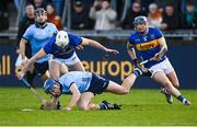 3 February 2024; Paul Crummey of Dublin is tackled by Johnny Ryan of Tipperary during the Allianz Hurling League Division 1 Group B match between Dublin and Tipperary at Parnell Park in Dublin. Photo by Tyler Miller/Sportsfile