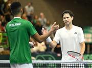 3 February 2024; Dominic Thiem of Austria, right, and Michael Agwi of Ireland after their singles match on day one of the Davis Cup World Group I Play-off 1st Round match between Ireland and Austria at UL Sport Arena in Limerick. Photo by Brendan Moran/Sportsfile