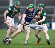 3 February 2024; Cianan Fahy of Galway in action against Darragh Clinton, left, and David Williams of Westmeath during the Allianz Hurling League Division 1 Group B match between Galway and Westmeath at Pearse Stadium in Galway. Photo by Piaras Ó Mídheach/Sportsfile